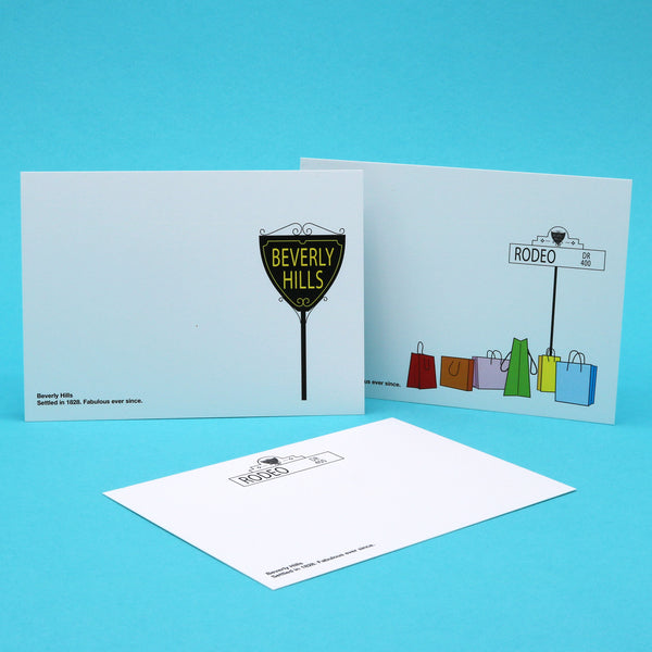 Notecards with illustrations Beverly HIlls city sign, shopping bags and Rodeo Drive street sign.