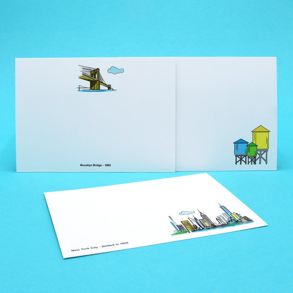 New York City note cards with illustrations of the skyline, Brooklyn Bridge and the famous rooftop water towers.