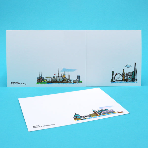 Notecards with illustrations of London, Venice and Amsterdam skylines and landmarks.