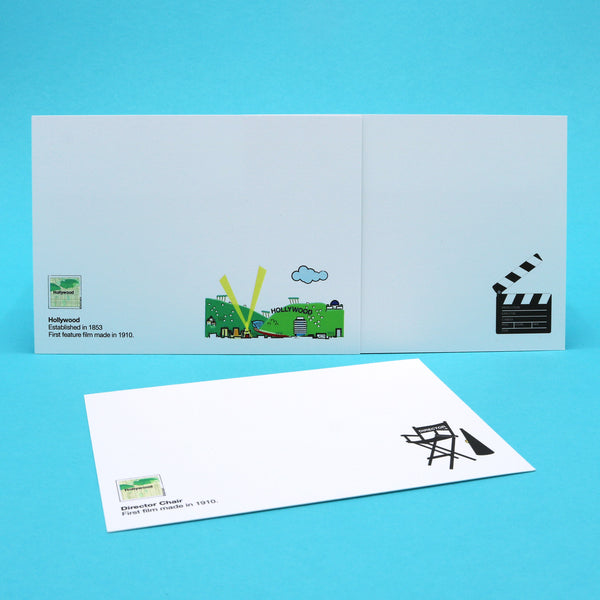 Notecards with illustrations of iconic Hollywood movie making equipment such as a director's chair and a clapperboard.