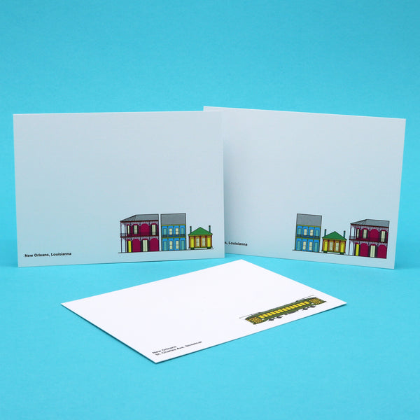 Notecards with illustrations of New Orleans French Quarter houses and famous streetcars.
