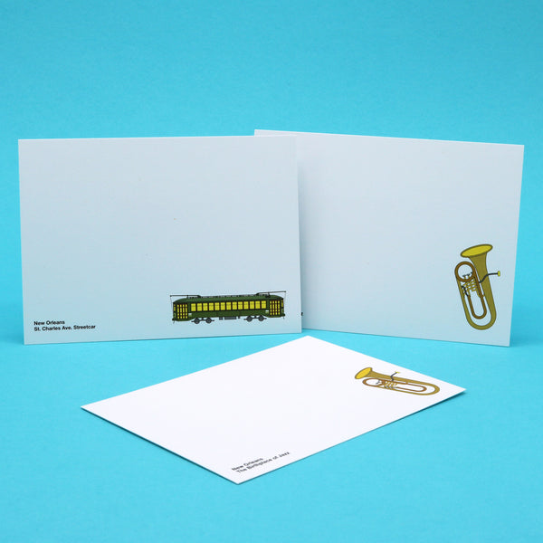 Notecards with illustrations of New Orleans Streetcar and  a tuba.