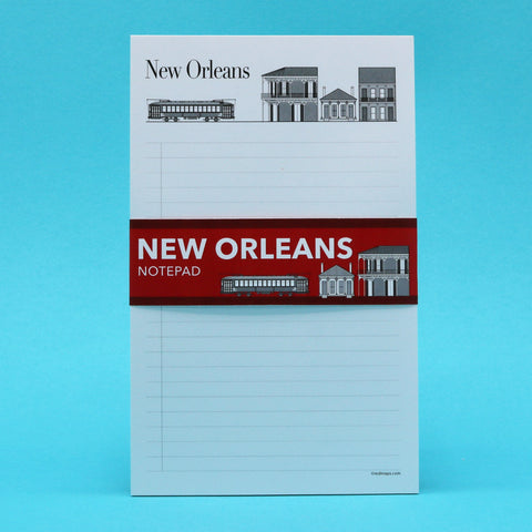New Orleans writing pad with illustrations of the city's landmark row houses and streetcar.