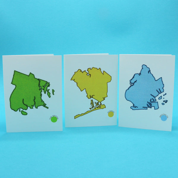 Notecards with colorful illustrations of New York City's boroughs, Brooklyn, Queens and the Bronx.